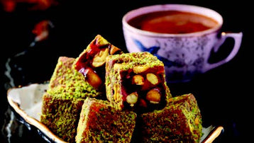 Indulge in the opulent flavors of Sultan's Premium Turkish Delight - Extra Double Pomegranate Flavor with Pistachio Covered Pistachio. Each sumptuous piece is a symphony of taste, boasting an intensified burst of tangy pomegranate complemented by the rich nuttiness of pistachios. Elevate your Ramadan festivities with this exquisite delicacy, fit for royalty. Order now for delivery in South Florida and across the US.