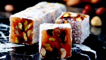 Indulge in the exquisite blend of flavors with Sultan's Premium Turkish Delight - Mix Nuts Covered Coconut. Each delightful piece is adorned with a variety of nuts, including almonds, walnuts, and hazelnuts, all enrobed in a luscious coconut coating. Elevate your Ramadan celebrations with this luxurious treat, perfect for sharing with loved ones. Order now for delivery in South Florida and across the US.