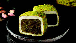 Experience the ultimate indulgence with Sultan's Premium Turkish Delight - Pistachio Paste Covered Pistachio. Each lavish piece boasts a double dose of pistachio goodness, with a creamy pistachio paste enrobing whole pistachios. Delight in the rich, nutty flavor and luxurious texture as you savor every bite. Elevate your Ramadan celebrations with this exquisite delicacy, fit for royalty. Order now for delivery in South Florida and across the US.  