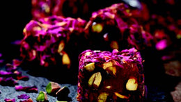 Indulge in the royal flavors of Sultan's Premium Turkish Delight - Pomegranate Flavor with Pistachio Covered Rose Petals. Each luxurious piece offers a delightful combination of tangy pomegranate, creamy pistachios, and delicate rose petals, creating a symphony of taste and texture. Elevate your Ramadan celebrations with this exquisite delicacy, fit for royalty. Order now for delivery in South Florida and across the US.  